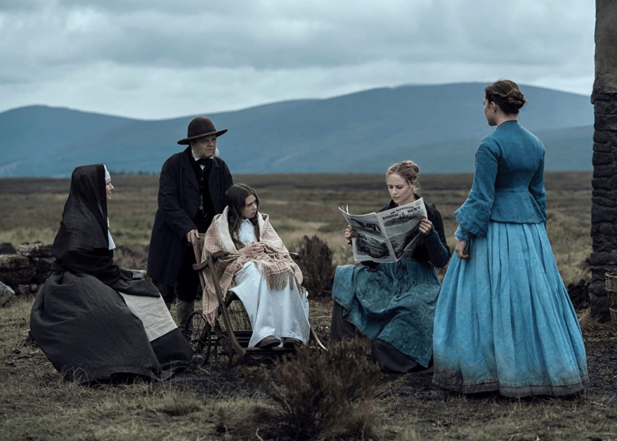 (L–R) Sister Michael (Josie Walker), Dr. McBrearty (Toby Jones), Anna O'Donnell (Kila Lord Cassidy), Maggie Ryan (Ruth Bradley), and nurse Lib Wright (Florence Pugh), in "The Wonder." (Element Pictures/Netflix)