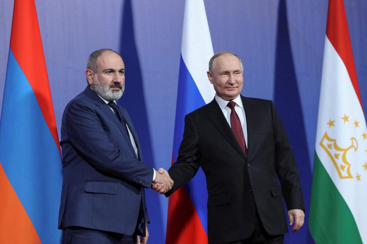 Armenian Prime Minister Nikol Pashinyan and Russian President Vladimir Putin at a CSTO summit hosted by Yerevan on Nov. 23, 2022. (Hayk Baghdasaryan/Photolure via Reuters)