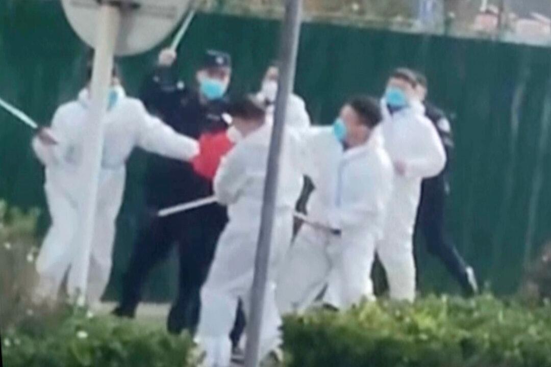 A Beijing Crackdown on COVID Protests Could Have Same Economic Effect as Lockdowns on America: Expert