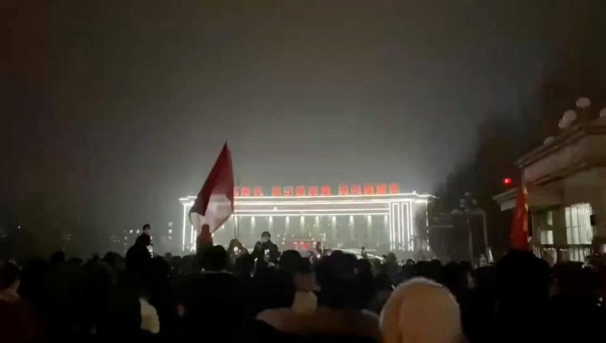 Protests against strict COVID-19 curbs in Urumqi city, Xinjiang, China, in this screen grab obtained from a video released on Nov. 25, 2022. (Video obtained by Reuters/via Reuters)