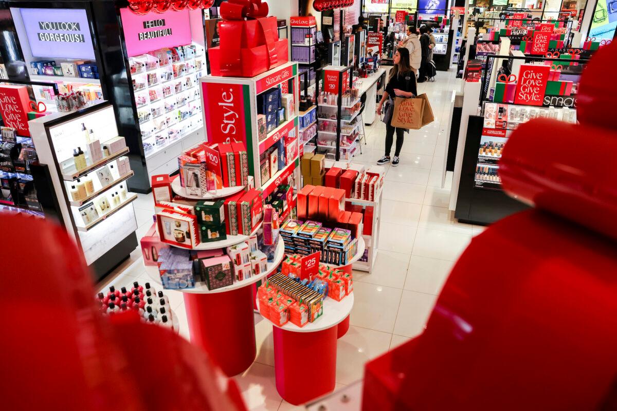 Customers shop in a nearly-empty Macy's early on Black Friday in New York on Nov. 25, 2022. (Julia Nikhinson/AP Photo)