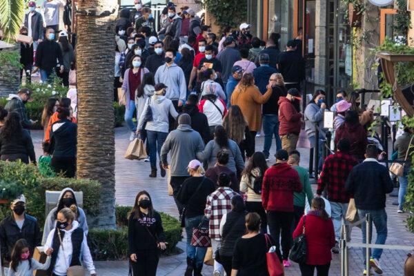 Shoppers walk around Citadel Outlets in Torrance, Calif., on Black Friday, Nov. 26, 2021. (Apu Gomes/AFP via Getty Images)