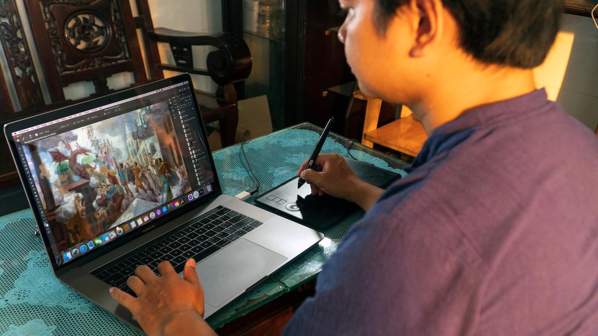 Loc Minh Duong working on a digital painting. (Courtesy of Loc Minh Duong)