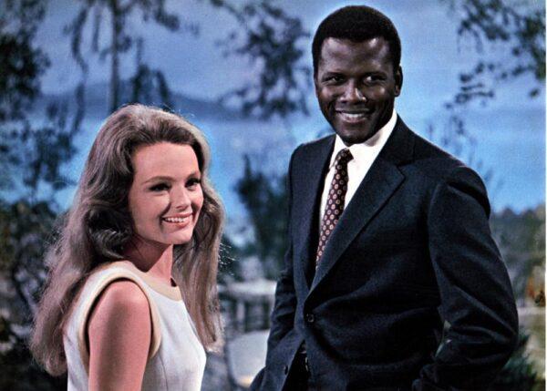 Joanna Drayton (Kathryn Houghton) and John Prentice Jr. (Sidney Poitier) have a difficult time telling their families they want to marry, in "Guess Who's Coming to Dinner." (MovieStillsDB)
