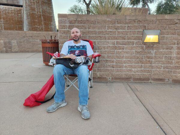Michael Mendoza of Mesa, Ariz., was among the last to leave a sit-in demonstrators in Phoenix on Nov. 25, 2022. (Allan Stein/The Epoch Times)