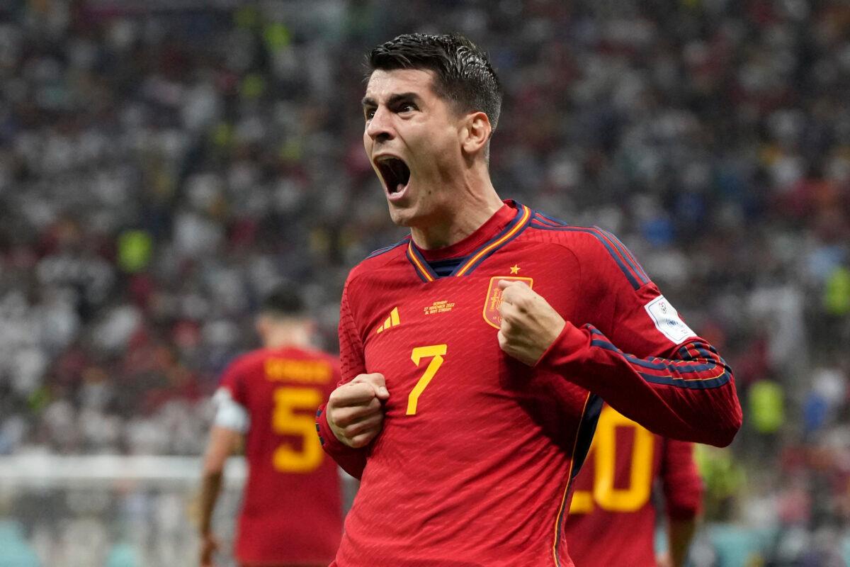 Spain's Alvaro Morata celebrates after scoring the opening goal during the World Cup group E soccer match between Spain and Germany, at the Al Bayt Stadium in Al Khor, Qatar, on Nov. 27, 2022. (Matthias Schrader/AP Photo)