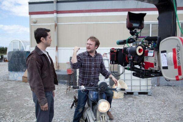 Actor Joseph Gordon-Levitt (L) and director Rian Johnson on the set of "Loopers." (Tri-Star Pictures)