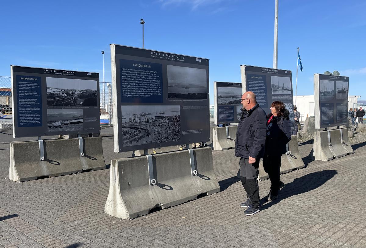 Visitors examine historical photos and information at a public display along the Old Harbor in Reykjavik, Iceland. (Photo courtesy of Lesley Frederikson)