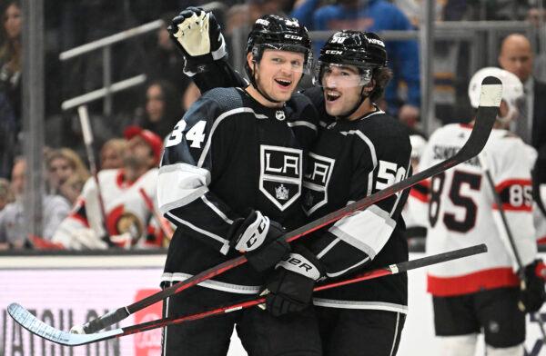 Los Angeles Kings right wing Arthur Kaliyev is congratulated by Los Angeles Kings defenseman Sean Durzi after scoring a goal against the Ottawa Senators during the second period in an NHL hockey game in Los Angeles on Nov. 27, 2022. (John McCoy/AP Photo)