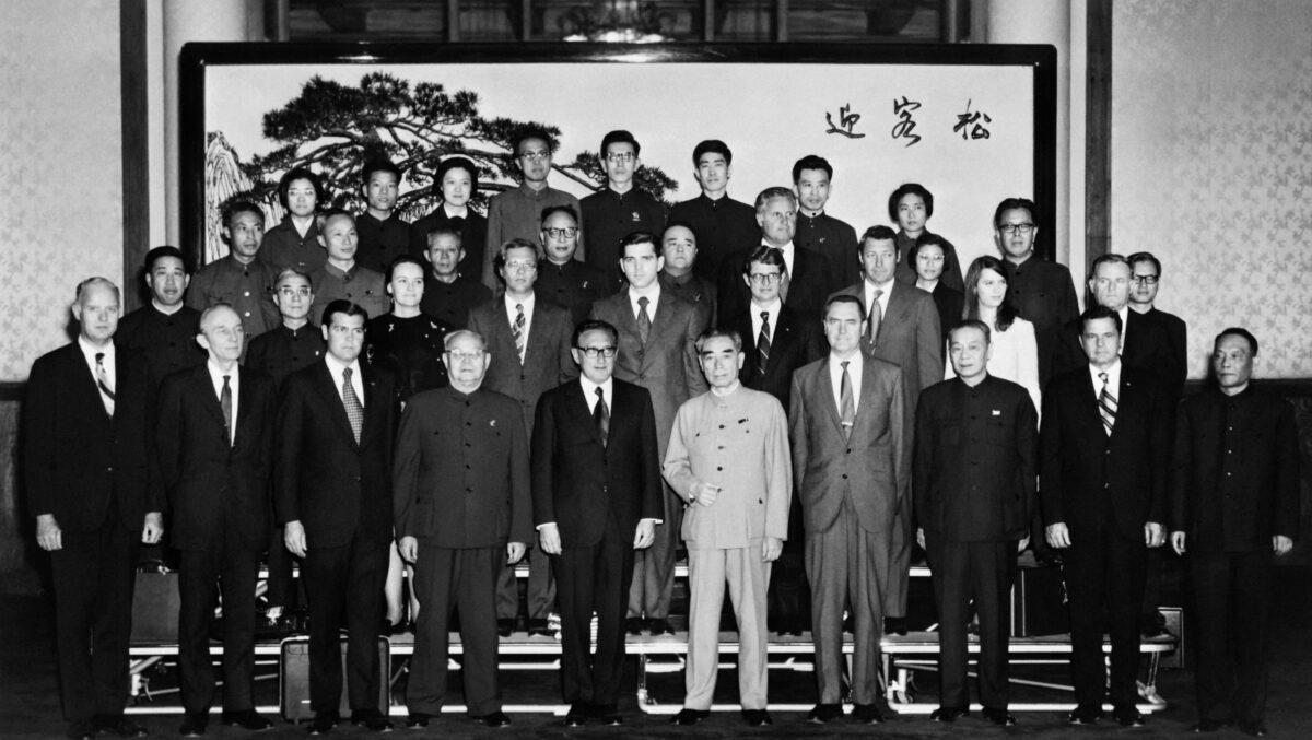 U.S. President Richard Nixon's special adviser, Henry Kissinger (5 CL), and Chinese Premier Zhou Enlai (6 CL) pose with their delegations for a group photo in Beijing on Oct. 22, 1971. Kissinger traveled to China to meet with Zhou to set the stage for Nixon's historic visit in 1972. (AFP via Getty Images)
