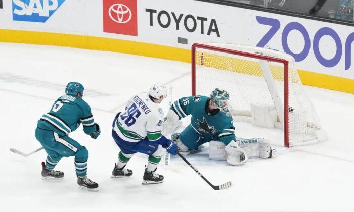NHL Roundup: Canucks Win as Andrei Kuzmenko Scores in Overtime