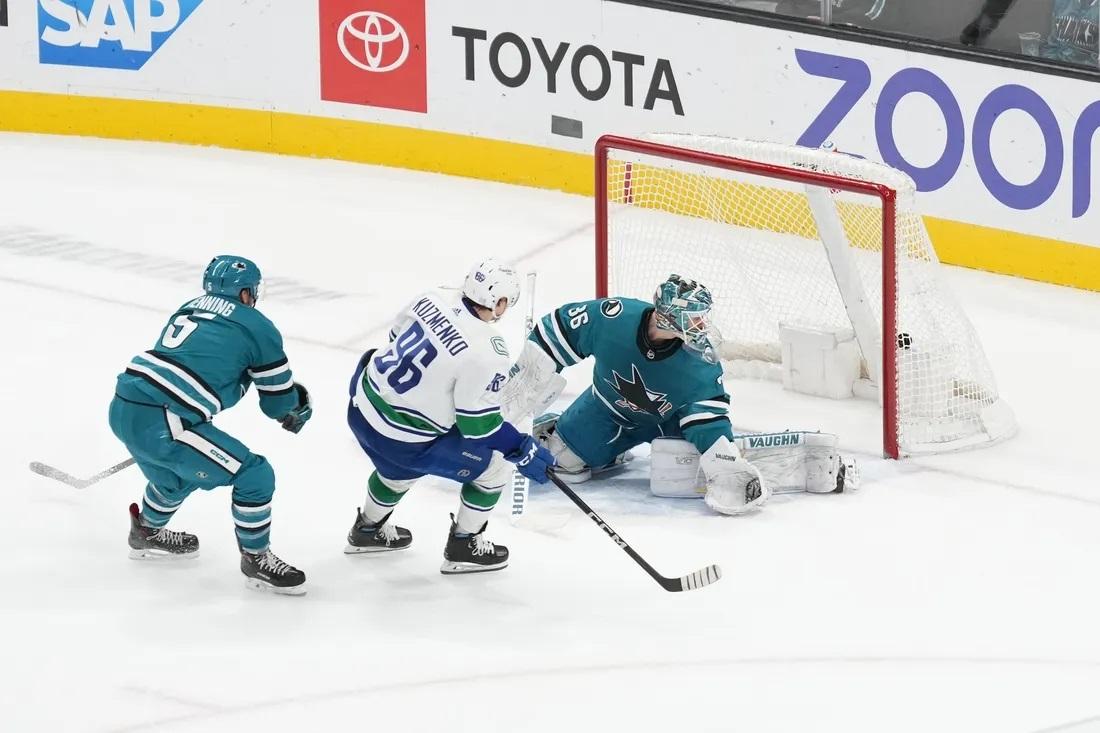 NHL Roundup: Canucks Win as Andrei Kuzmenko Scores in Overtime