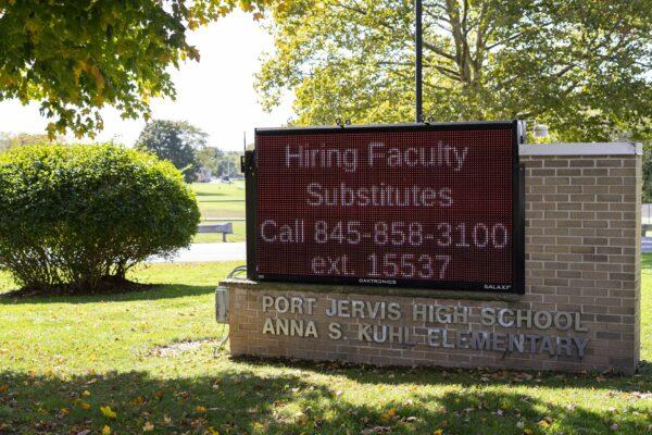 A hiring sign outside Port Jervis High School in New York on Oct. 9, 2022. (Chung I Ho/The Epoch Times)