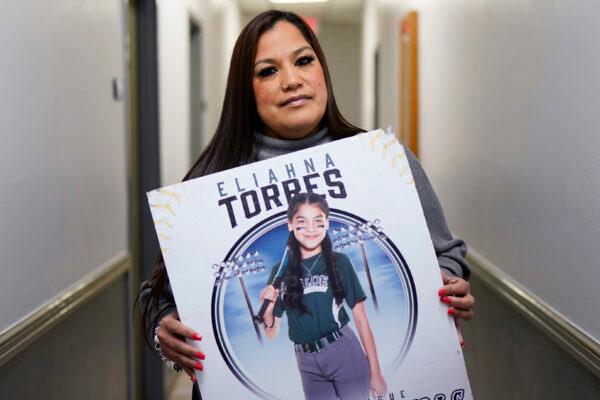 Sandra Torres holds a photo of her daughter Eliahna at her attorney's office in San Antonio on Nov. 28, 2022. (Eric Gay/AP Photo)