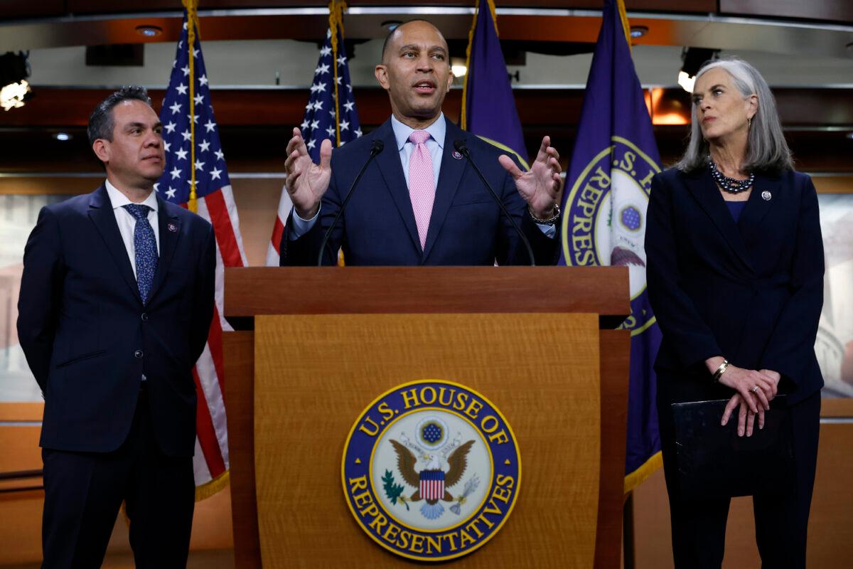 Rep. Hakeem Jeffries (D-N.Y.) (C) talks to reporters with Rep. Pete Aguilar (D-Calif.) (L) and Rep. Katherine Clark (D-Mass.) after they were elected to House Democratic leadership for the 118th Congress at the U.S. Capitol Visitors Center in Washington on Nov. 30, 2022. (Chip Somodevilla/Getty Images)