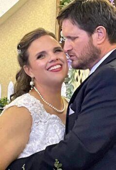 Laura Perry Smalts, who once lived a transgender lifestyle and presented as a male, is pictured at her wedding with husband, Perry Smalts, in 2022. (Courtesy of Laura Perry Smalts, transgendertotransformed.com)