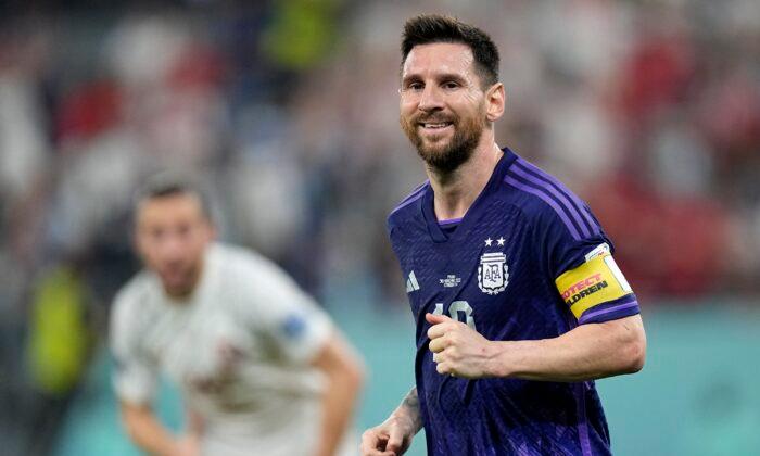 Messi and Argentina Advance at World Cup, Beat Poland 2–0
