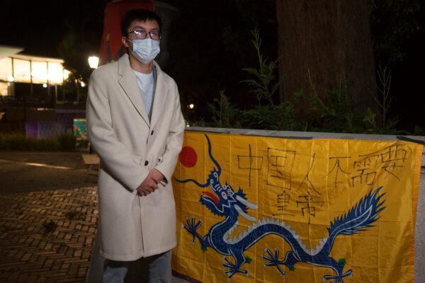 UC Berkeley alumni Andrew attends the candlelight vigil at UC Berkeley on Nov. 28, 2022. (Lear Zhou/The Epoch Times)