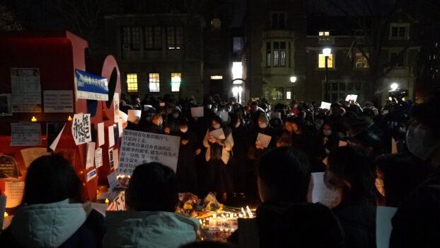 Several hundred Chinese students at the University of Pennsylvania joined a candlelight vigil to mourn those who lost their lives in the Urumqi fire, in Xinjiang, in support of demonstrations in China calling for an end to COVID-19 lockdowns, on Nov. 29, 2022. (William Huang/The Epoch Times)