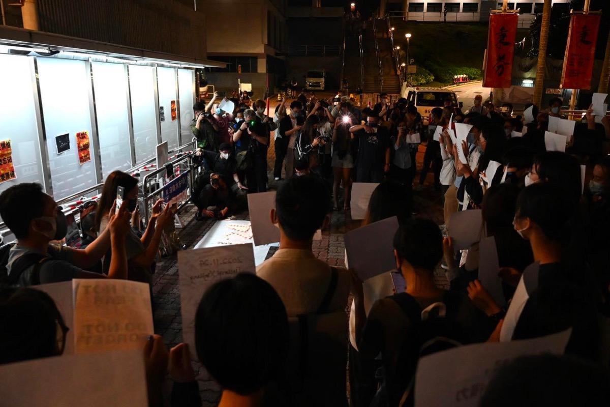 On Nov. 29 night, dozens of university students of CUHK gathered at the Central Square of CUHK to show solidarity with the demonstrators in mainland China. (Courtesy of University Community Press)