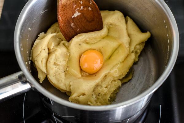 Beat the eggs thoroughly into the dough, one at a time. (Courtesy of Audrey Le Goff)