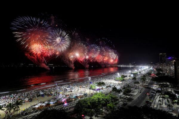 Fireworks explode during New Year celebrations, at the Copacabana beach, in Rio de Janeiro, Brazil, Dec. 31, 2022. (Aline Massuca/Reuters)