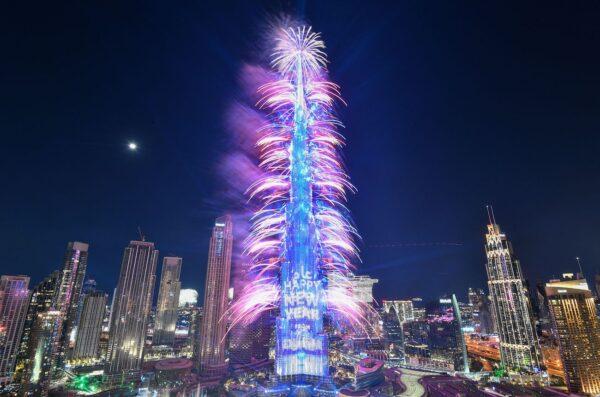 New Year's Eve fireworks light the landmark Burj Khalifa tower at midnight in the Gulf emirate of Dubai on Dec. 31, 2022. (Ryan Lim/AFP via Getty Images)
