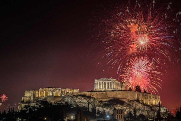 Fireworks explode over the Acropolis during New Year celebrations in Athens early on Jan. 1, 2023. (Louisa Gouliamaki/AFP via Getty Images)