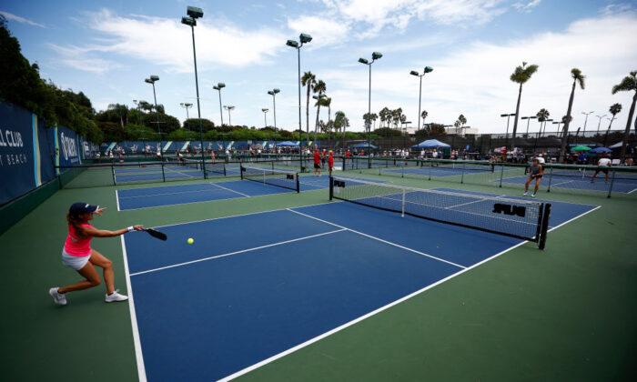 Amy Pazahanick returns a shot to Sam Goldenherrsh at The Tennis and Pickleball Club in Newport Beach, Calif., on Sept. 4, 2022. (Ronald Martinez/Getty Images)