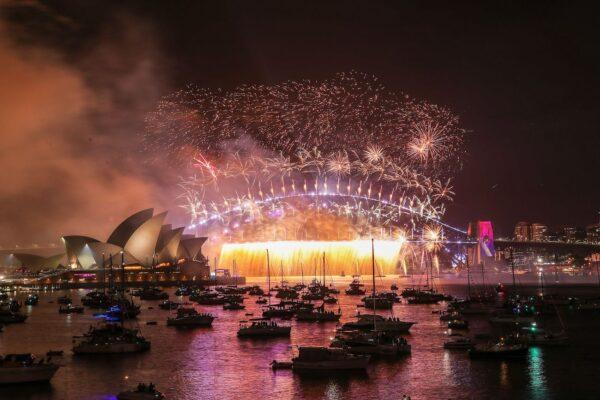 Fireworks light up over Sydney Harbour Bridge during New Year's Eve celebrations in Sydney, Australia, on Jan. 1, 2023. (Roni Bintang/Getty Images)