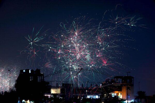 Fireworks light up the sky in Iraq's southern city of Nasiriyah amid New Year's celebrations, early on Jan. 1, 2023. (Asaad Niazi/AFP via Getty Images)