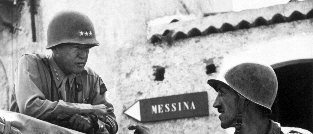 <br/>General Patton (L) in Messina, Italy, during World War II, in “Silence Patton.” (The Nexus Project)
