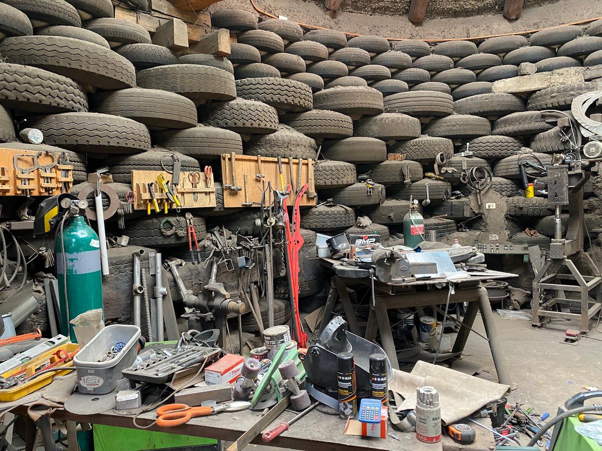 Sergio Andrade Huber's workshop, where he stores some of the recycled materials he integrates into the houses he builds. (Tim Johnson)