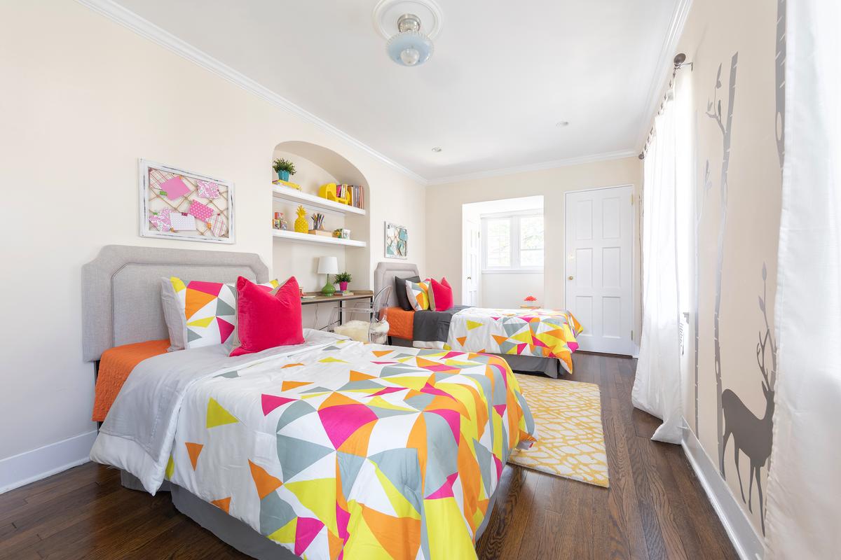 Hot pink adds crisp "burst" of color in this children’s bedroom. (Provided photo/TNS)