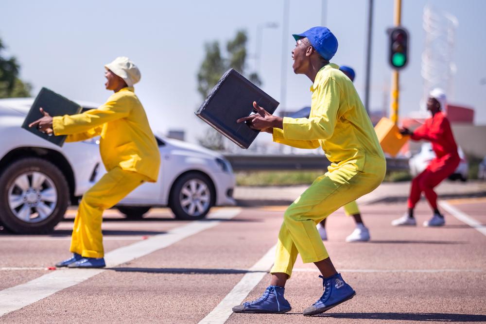 Street dancers perform at an intersection in Johannesburg. (Rich T Photo/Shutterstock)