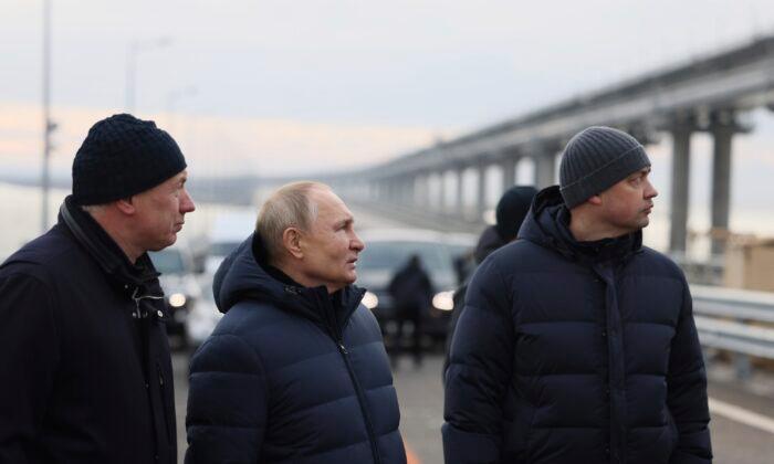 Russia’s Putin Drives Across Repaired Bridge to Crimea