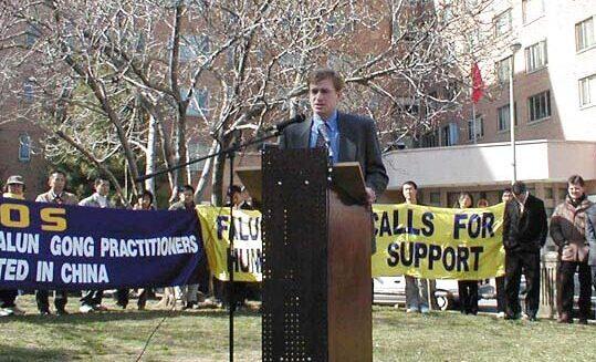 Levi Browde at a press conference in front of the then Chinese embassy building in Washington, on Feb. 20, 2002. (Courtesy of Levi Browde)