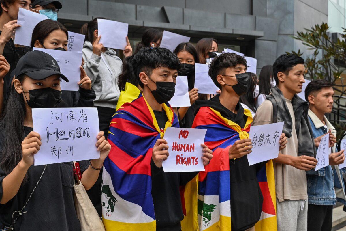Tibetan youth stage a silent protest in Bengaluru on Dec. 1, 2022. (Manjunath Kiran/AFP via Getty Images)