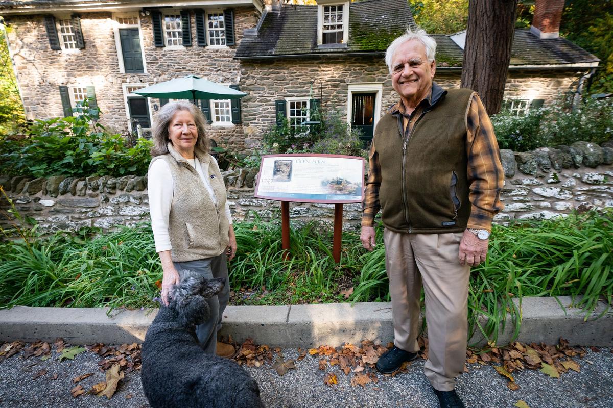 Craig Johnson, Carol Adams, and Rise, their standard poodle, live at Glen Fern, a historic house on the Wissahickon Creek in Northwest Philadelphia. (Jessica Griffin/The Philadelphia Inquirer/TNS)