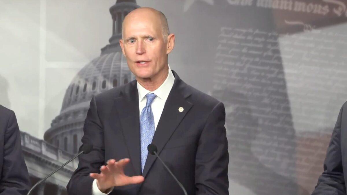 Sen. Rick Scott (R-Fla.) speaks at a press conference about Democrats’ massive omnibus spending bill in Washington on Dec. 7, 2022, in a still from a live stream released by NTD. (NTD)
