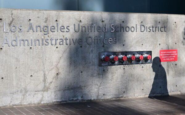 The shadow of a pedestrian is seen walking past the headquarters of the Los Angeles Unified School District in Los Angeles on Oct. 3, 2022. (Frederic J. Brown/AFP via Getty Images)