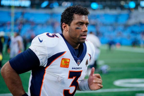 <br/>Denver Broncos quarterback Russell Wilson leaves the field after their loss during an NFL football game between the Carolina Panthers and the Denver Broncos in Charlotte, N.C., on Nov. 27, 2022. (Jacob Kupferman/AP Photo)