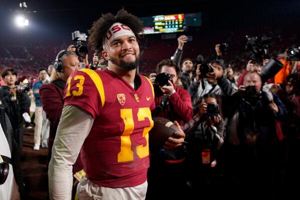 Southern California quarterback Caleb Williams smiles after USC defeated Notre Dame 38–27 in an NCAA college football game , in Los Angeles, Nov. 26, 2022. (Mark J. Terrill, File/AP Photo)