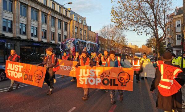 Just Stop Oil protesters conducting a slow march on the Old Kent Road in south London on Dec. 6, 2022. (Just Stop Oil)