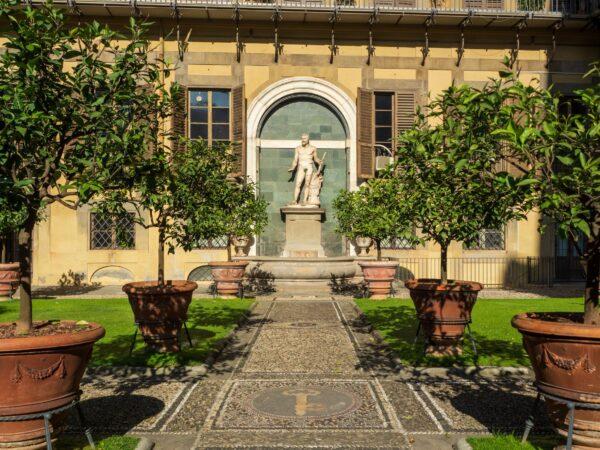 Under the Tuscan sun rests the beautiful garden of the Palazzo Medici Riccardi. It's filled with lemon trees, mosaic pavement, and figures from Greco-Roman mythology. At the center, one can admire Hercules wearing the Nemean lion skin. (<a href="https://www.shutterstock.com/g/silverfox999">silverfox999</a>/<a href="https://www.shutterstock.com/image-photo/florence-italy-26-october-2019-walled-1634028712">Shutterstock</a>)