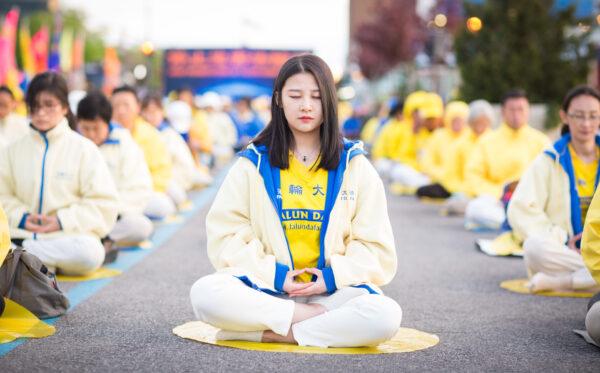 Hundreds of Falun Gong practitioners hold a vigil near the Chinese consulate in New York for World Falun Dafa Day, on May 11, 2017. (The Epoch Times)