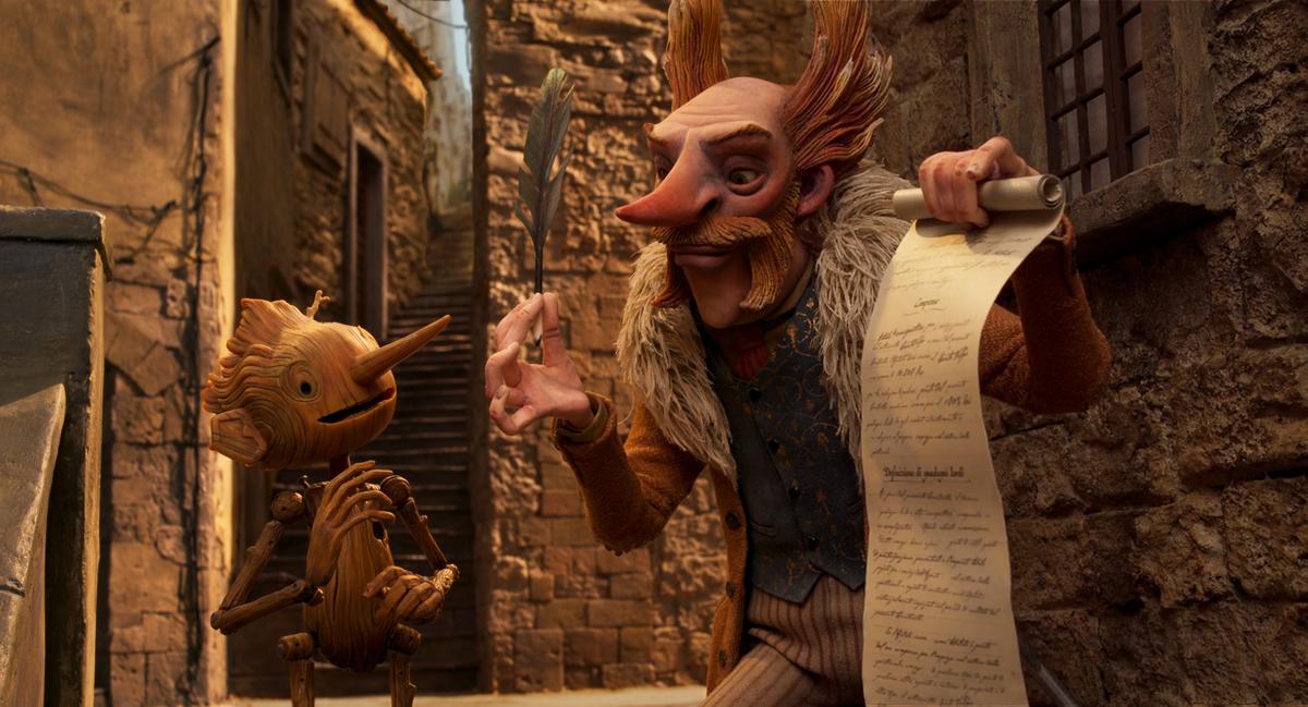 Pinocchio (voiced by Gregory Mann) and the sneaky Count Volpe (voiced by Christoph Waltz), in Guillermo del Toro's "Pinocchio." (Netflix)