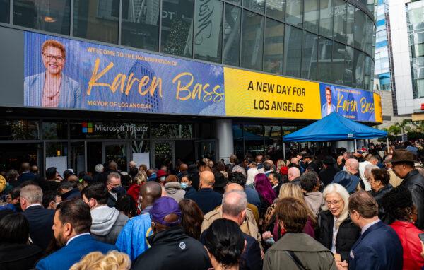 People wait in long lines for the mayoral inauguration ceremony of Karen Bass at the Microsoft Theatre in Los Angeles on Dec. 11, 2022. (John Fredricks/The Epoch Times)