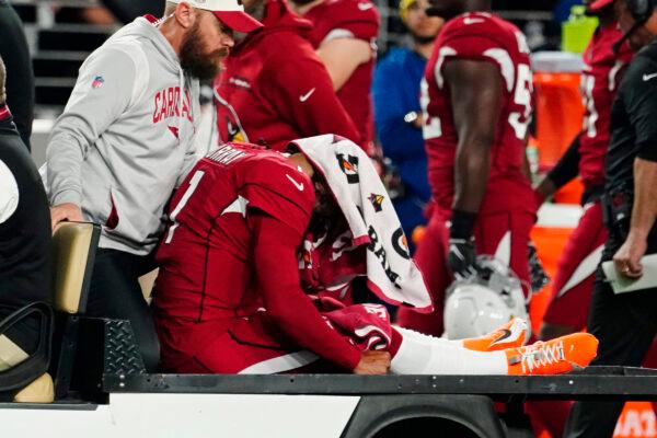 Arizona Cardinals quarterback Kyler Murray (1) is brought off the field after an injury during the first half of an NFL football game against the New England Patriots in Glendale, Ariz., on Dec. 12, 2022. (Darryl Webb/AP Photo)