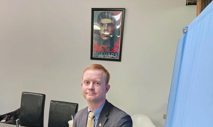 Alaska state Rep. David Eastman sits for a deposition at the office of the Northern Justice Project on Nov. 4, 2022. On the wall is a photo of communist revolutionary Ernesto 'Che' Guevara. (David Eastman Photo)